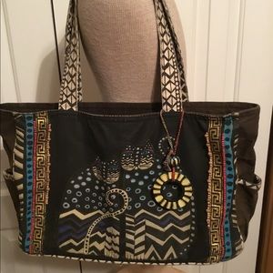 Shoulder tote and matching cosmetic bag.